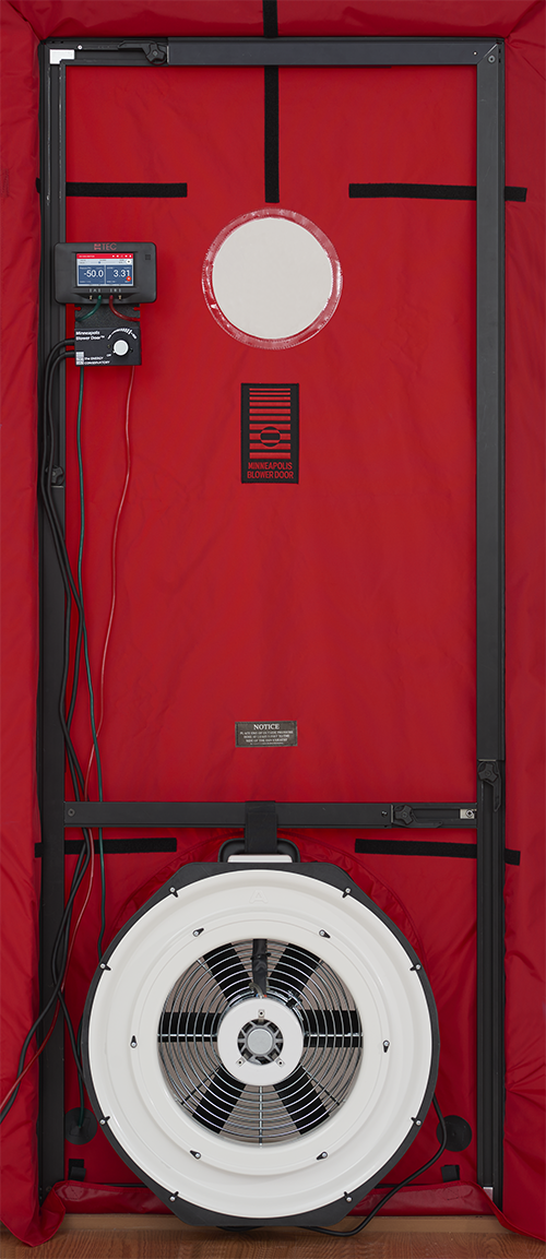 Blower door system used during a home energy audit before applying for home energy rebates